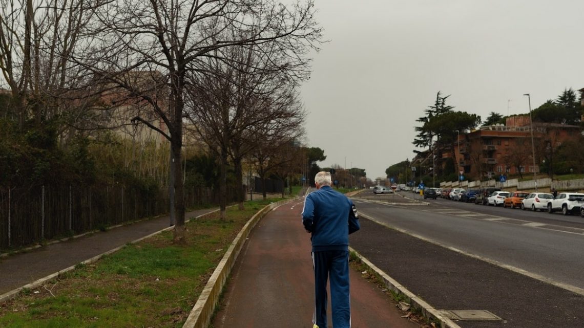 Man running in the cycle path - 2024 - Matteo del Piano.